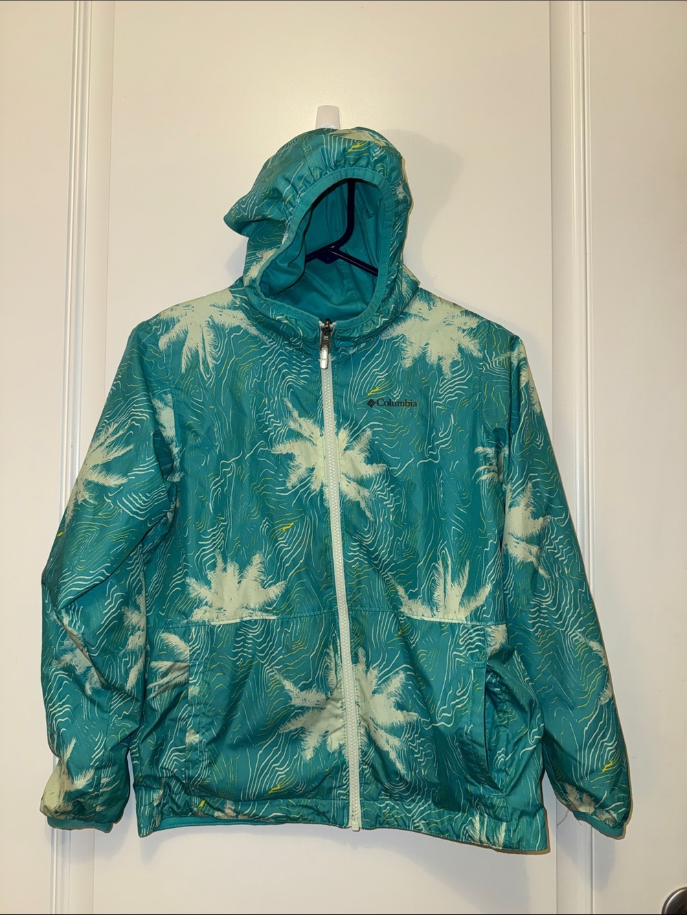 Columbia Teal Hooded Kids' reversible lined Raincoat with Cream Palm Print med
